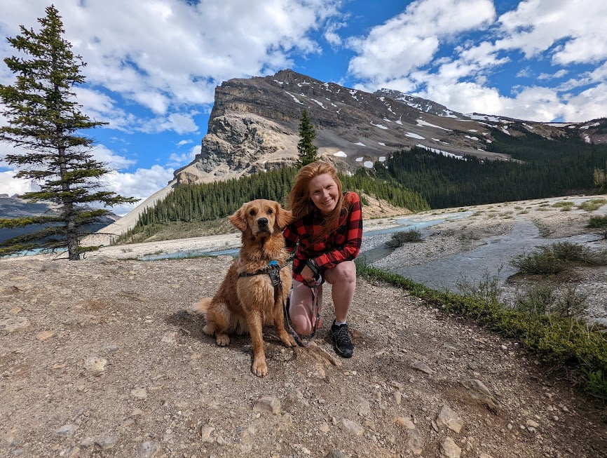 Amanda and Tucker, posing together in the Rocky Mountains